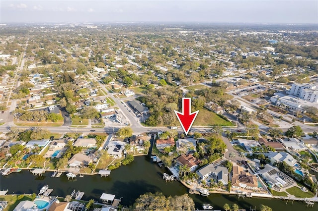 aerial view with a residential view and a water view