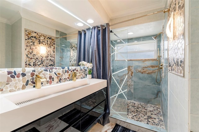 bathroom featuring a stall shower, tile walls, ornamental molding, and vanity