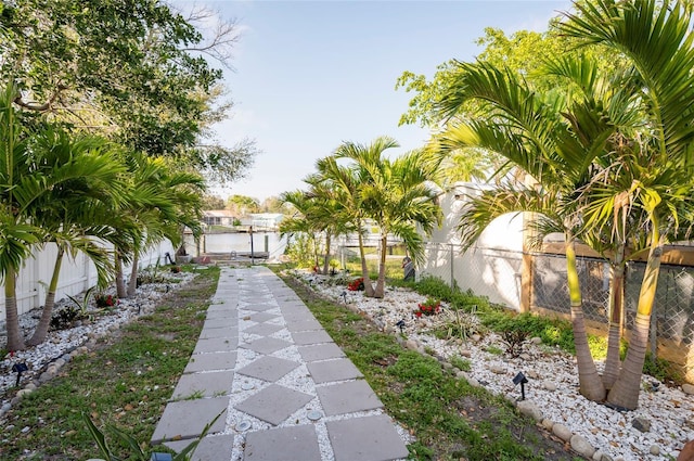 surrounding community with a gate and fence