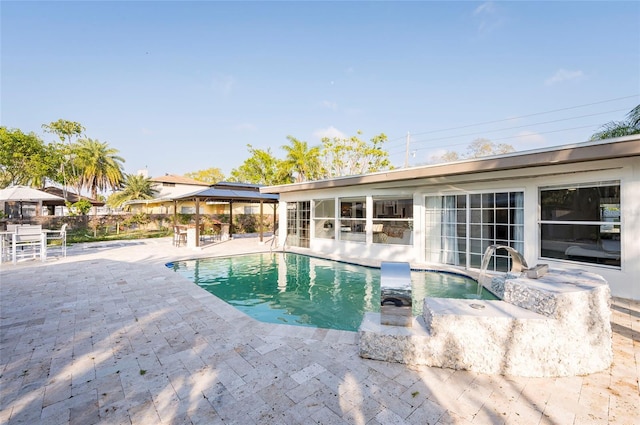 view of pool featuring a patio and a fenced in pool