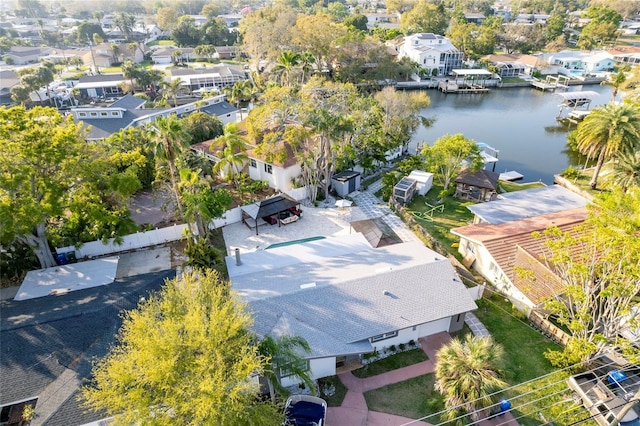 birds eye view of property featuring a residential view and a water view