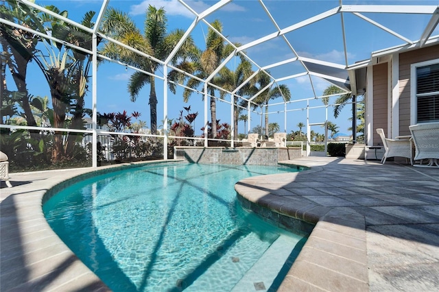 5616 Seagrass Pl, Apollo Beach, FL 33572 - pool featuring glass enclosure and a patio