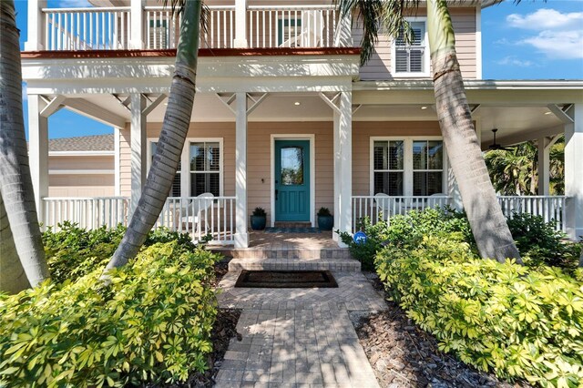 5616 Seagrass Pl, Apollo Beach, FL 33572 - view of exterior entry featuring covered porch