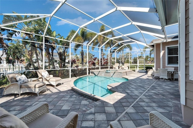 5616 Seagrass Pl, Apollo Beach, FL 33572 - view of pool with a patio, a pool with connected hot tub, and glass enclosure