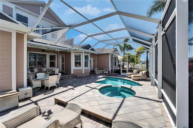 5616 Seagrass Pl, Apollo Beach, FL 33572 - view of swimming pool featuring a patio, a pool with connected hot tub, a lanai, and a ceiling fan