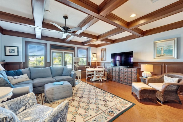 5616 Seagrass Pl, Apollo Beach, FL 33572 - living area featuring coffered ceiling, beamed ceiling, wainscoting, and wood finished floors