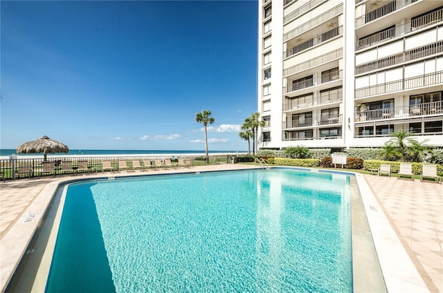 community pool with a water view