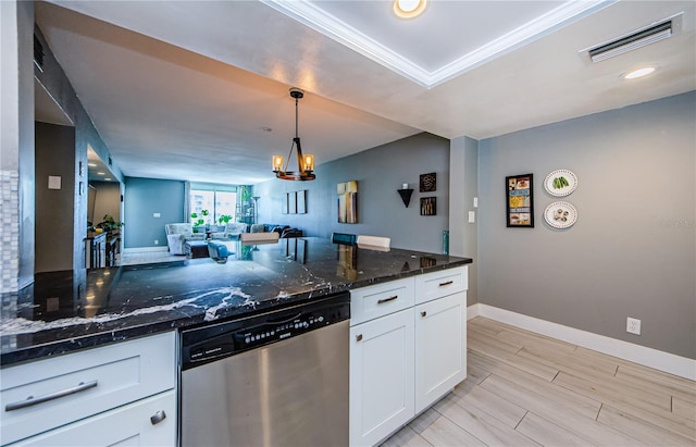 kitchen featuring visible vents, dark stone countertops, stainless steel dishwasher, open floor plan, and white cabinets