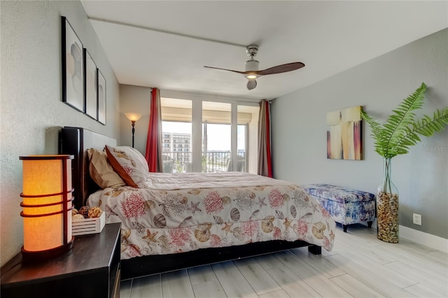 1460 Gulf Blvd Unit 506, Clearwater Beach, FL 33767 - bedroom featuring wood finished floors and a ceiling fan