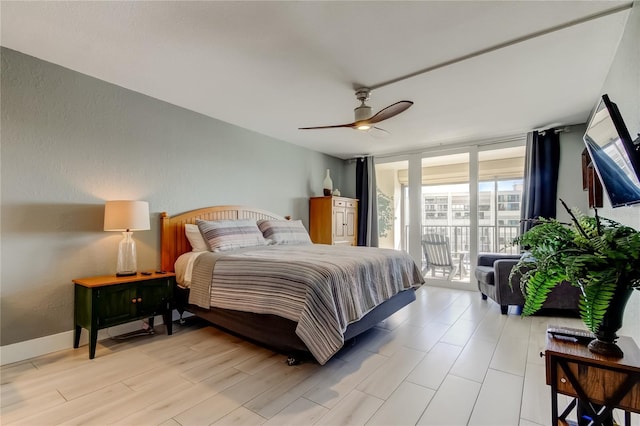 1460 Gulf Blvd Unit 506, Clearwater Beach, FL 33767 - bedroom with access to exterior, floor to ceiling windows, ceiling fan, and light wood-style flooring