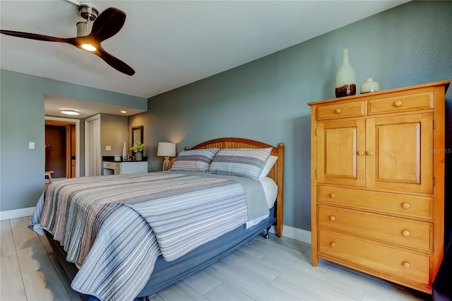 1460 Gulf Blvd Unit 506, Clearwater Beach, FL 33767 - bedroom featuring a ceiling fan and baseboards