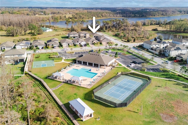 aerial view with a residential view and a water view