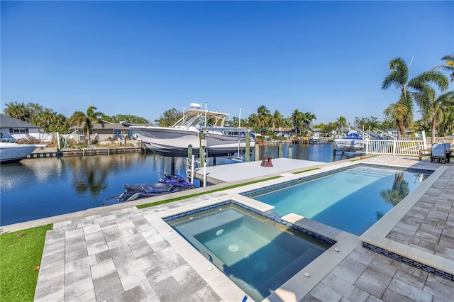 view of swimming pool with boat lift, a dock, a water view, fence, and a pool with connected hot tub