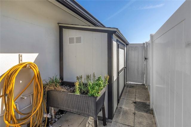 view of home's exterior featuring fence