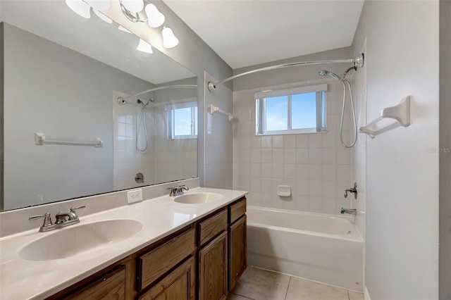 full bath featuring double vanity, shower / bath combination, a sink, and tile patterned floors