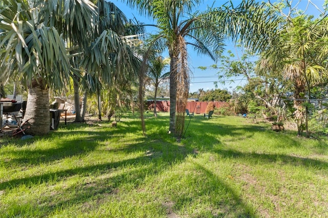 view of yard with fence