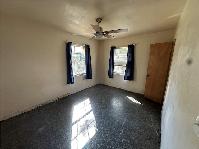 empty room with ceiling fan