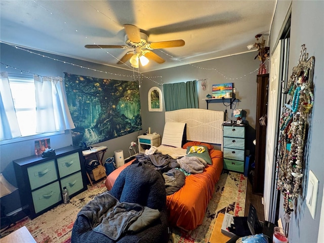 bedroom featuring ceiling fan