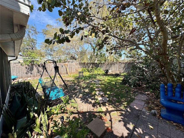 view of yard with a fenced backyard