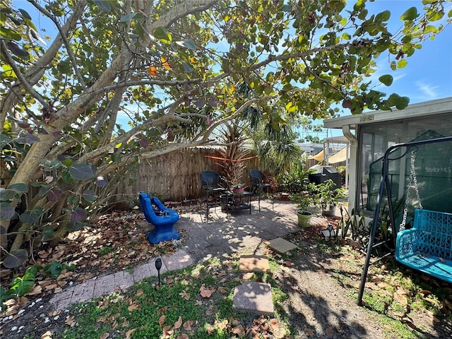 view of yard with a fenced backyard and a patio