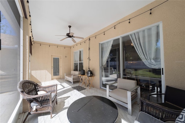 view of patio / terrace with outdoor dining area, outdoor lounge area, and ceiling fan