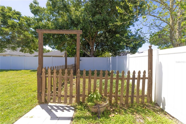 view of yard with a fenced backyard