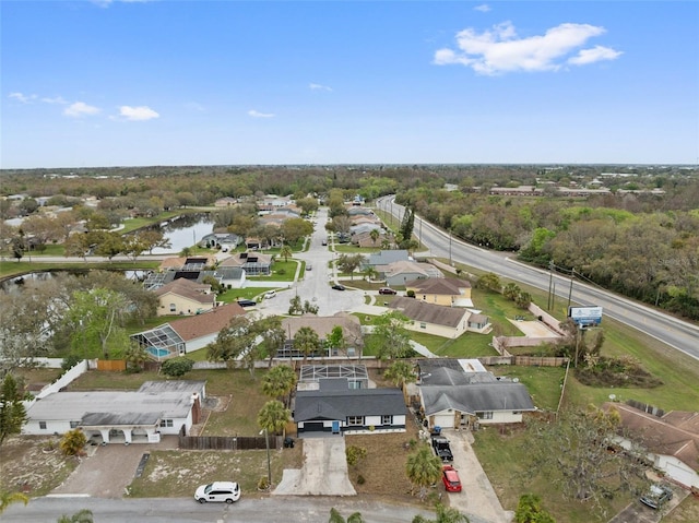 aerial view with a water view and a residential view