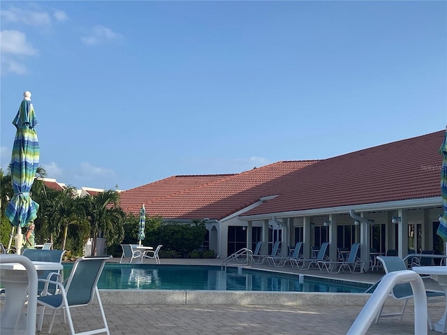 pool featuring a patio area