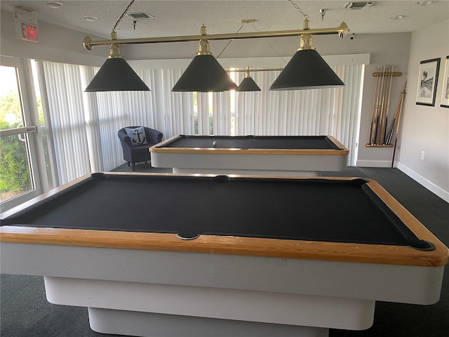 game room featuring visible vents, pool table, a textured ceiling, and baseboards