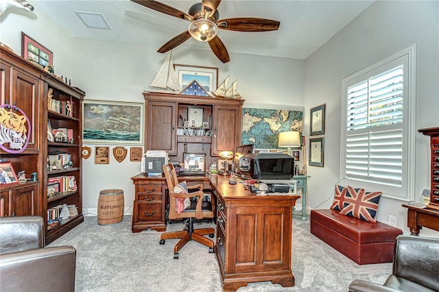 office space with ceiling fan, visible vents, and carpet flooring