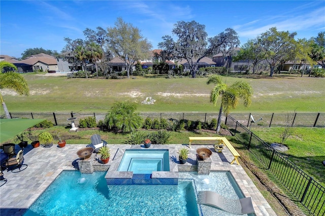 view of swimming pool with a fenced in pool, a lawn, a patio, a fenced backyard, and an in ground hot tub