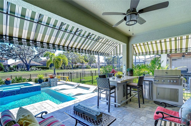 view of patio with area for grilling, ceiling fan, a fenced backyard, grilling area, and a pool with connected hot tub