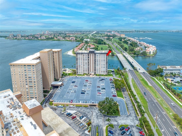 bird's eye view featuring a view of city and a water view