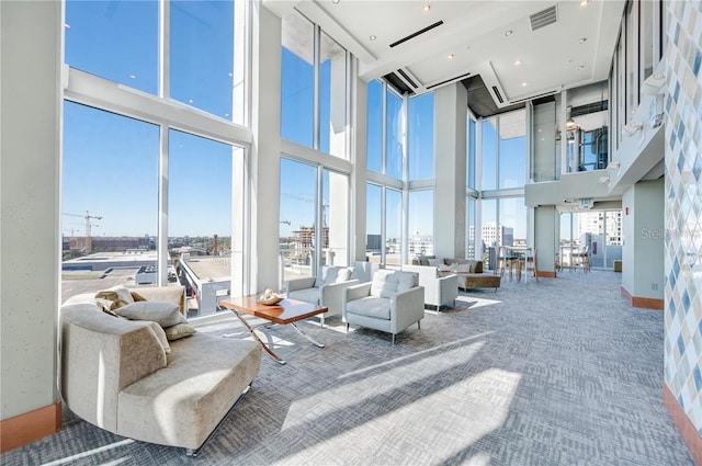 building lobby featuring visible vents and a city view