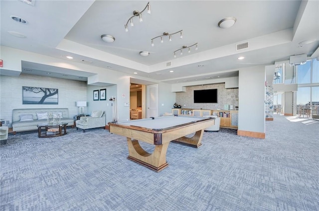 playroom featuring a tray ceiling, visible vents, carpet flooring, track lighting, and billiards