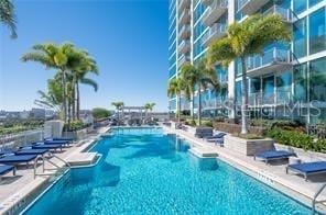 community pool with a patio