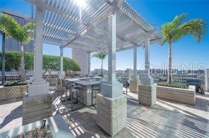 view of patio featuring a pergola