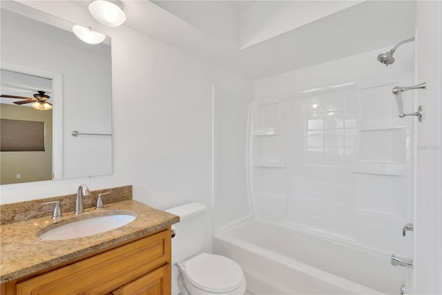 full bathroom with toilet, bathing tub / shower combination, a ceiling fan, and vanity