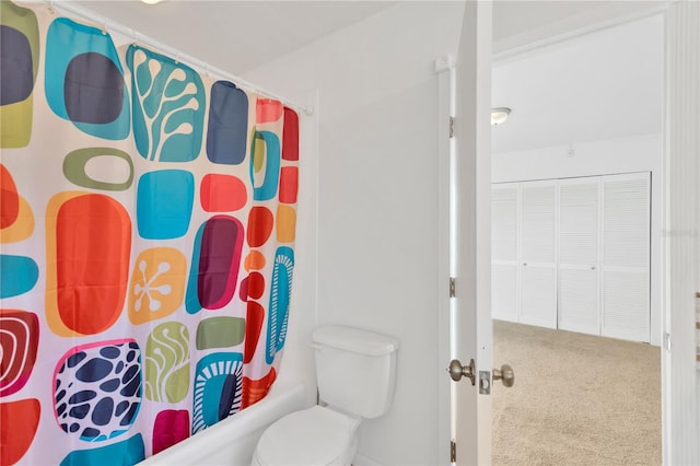 bathroom with toilet and shower / tub combo with curtain