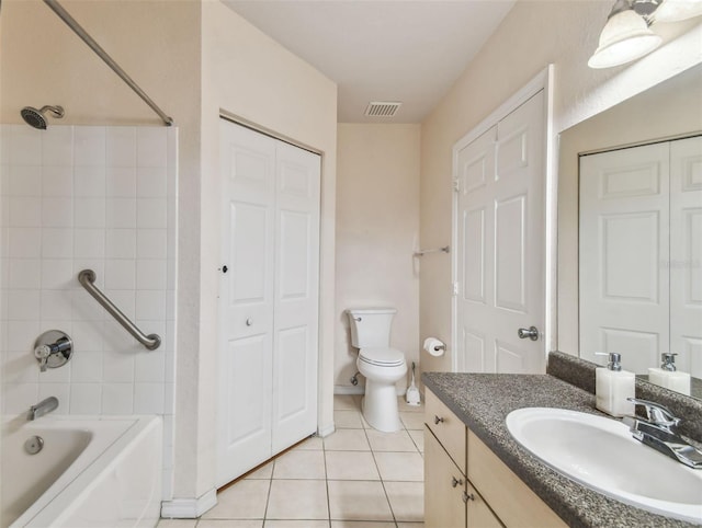 full bath featuring bathtub / shower combination, a closet, visible vents, vanity, and tile patterned floors