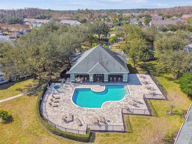 pool featuring a patio area and fence