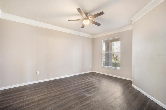 empty room featuring dark wood-style floors, a ceiling fan, baseboards, and crown molding