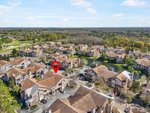 aerial view featuring a residential view and a water view