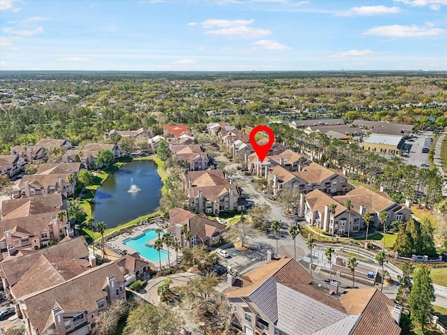 aerial view with a water view and a residential view