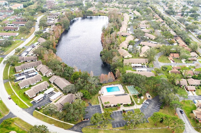 bird's eye view featuring a water view and a residential view