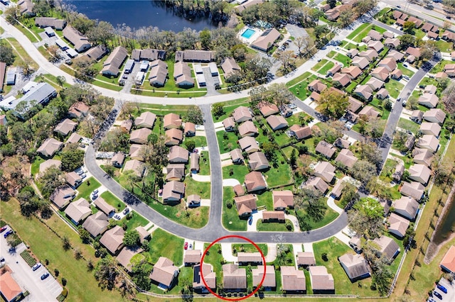 aerial view with a water view and a residential view