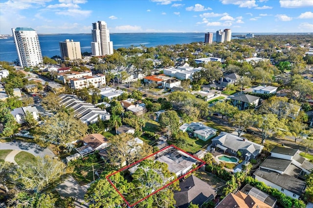 bird's eye view featuring a water view and a city view