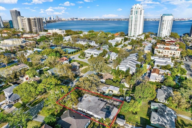 bird's eye view featuring a city view and a water view