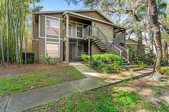 townhome / multi-family property with stairway