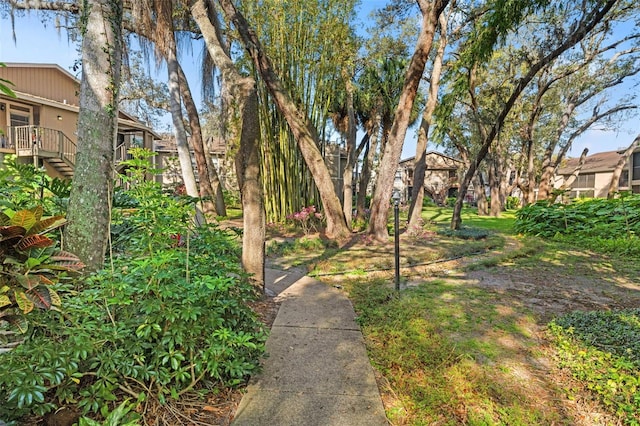 view of yard featuring stairway